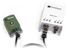 A titan accelermoter beside a centaur digitizer, connected by a large cable